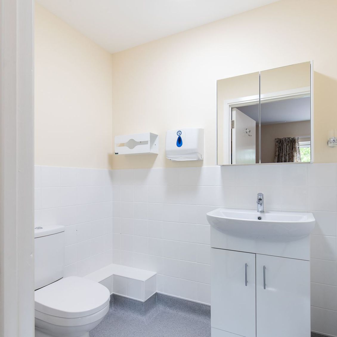 Falcon house white bathrooms